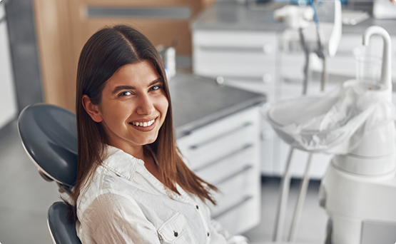 Young woman grinning in the treatment chair