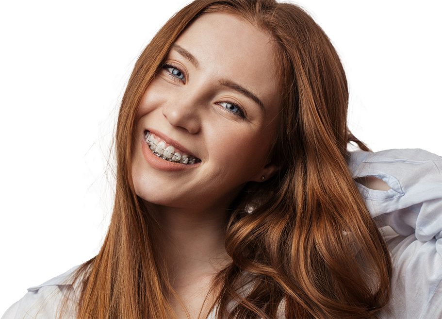 Smiling redheaded woman with braces