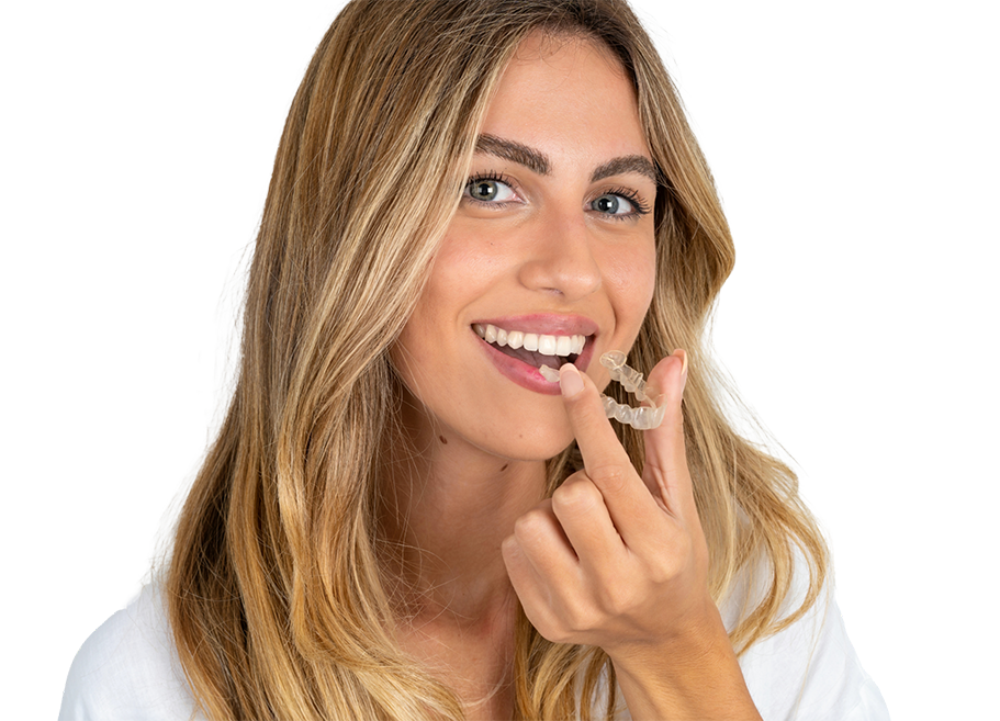 Blonde woman holding Invisalign