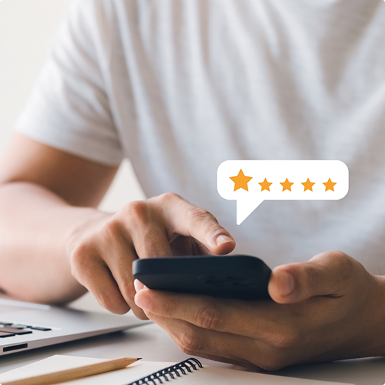 Person leaving a five star review on their phone